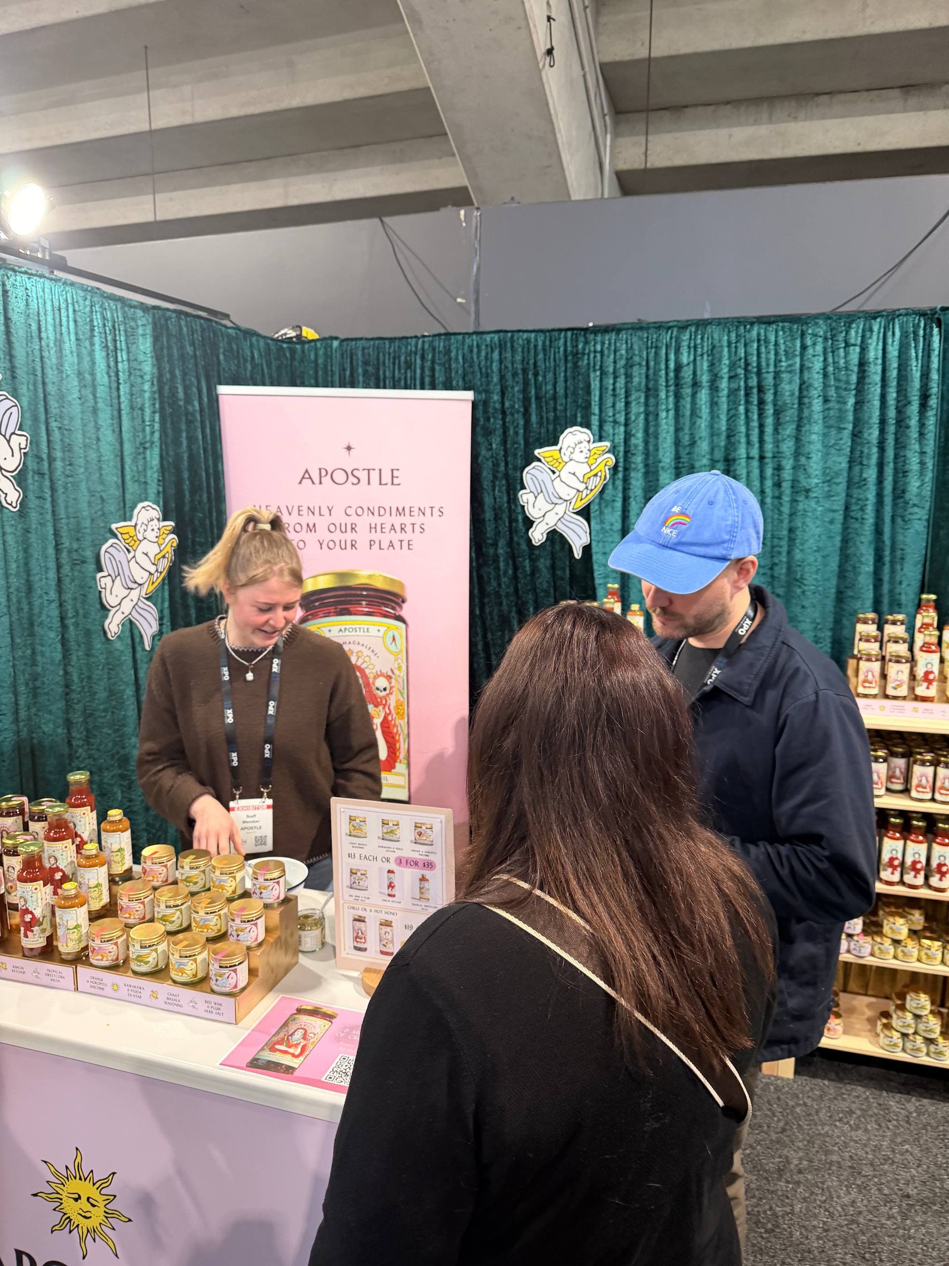 Visitors sampling products at the Apostle stand